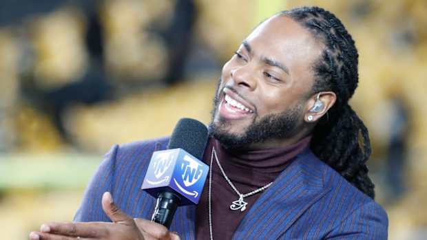 Former NFL cornerback turned “Thursday Night Football” analyst Richard Sherman talks before a game.